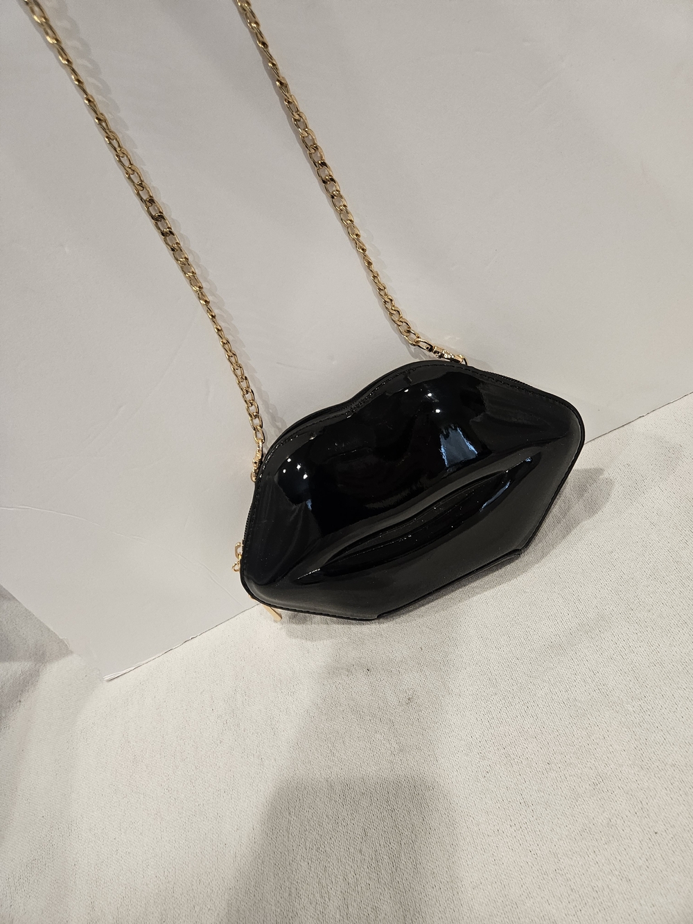 Black Lip-Shaped Patent Crossbody Bag with Gold Chain Lips Are Sealed - Picture 2 of 9